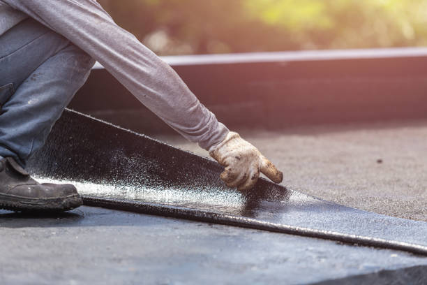 Professional Basement Waterproofing technician working in Chinook, MT